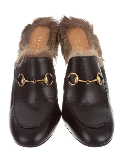 gucci princetown mules with fur.